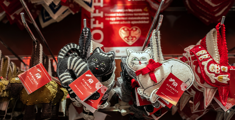 Handcrafted Hungarian cat souvenirs with red-and-white decoration